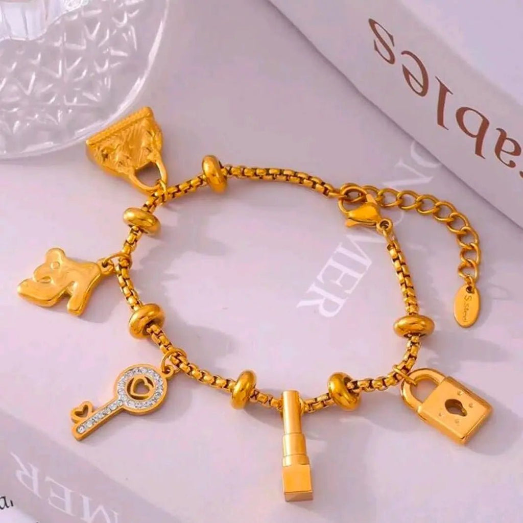 Iconic Charms - Aurora Jewellery NorgeGullarmbånd Aurora Jewellery Norge7